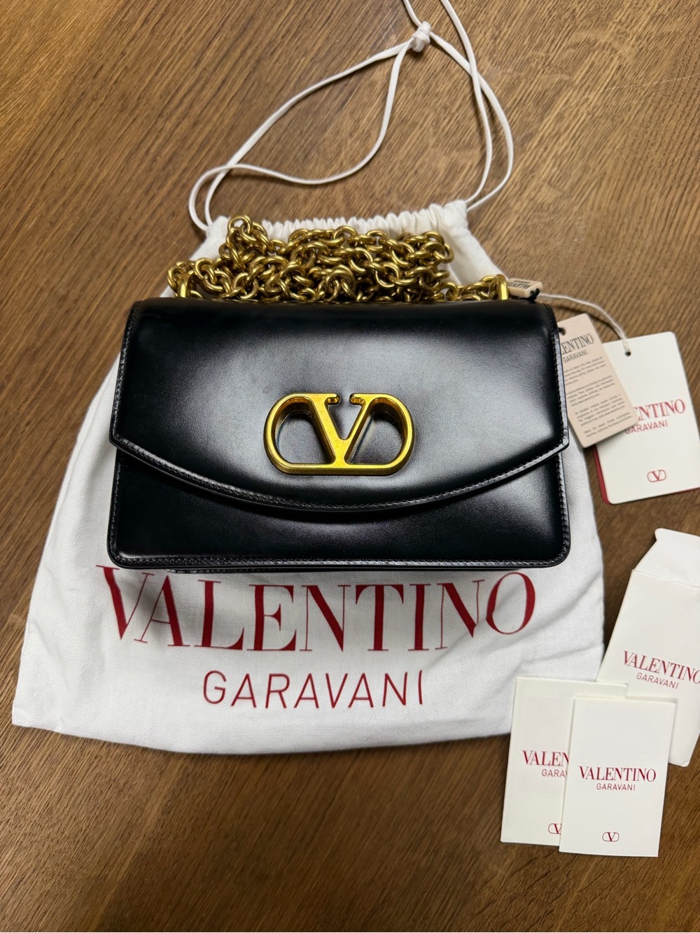 Valentino Garavani Black Leather Shoulder Bag with Gold V Logo and Chain
